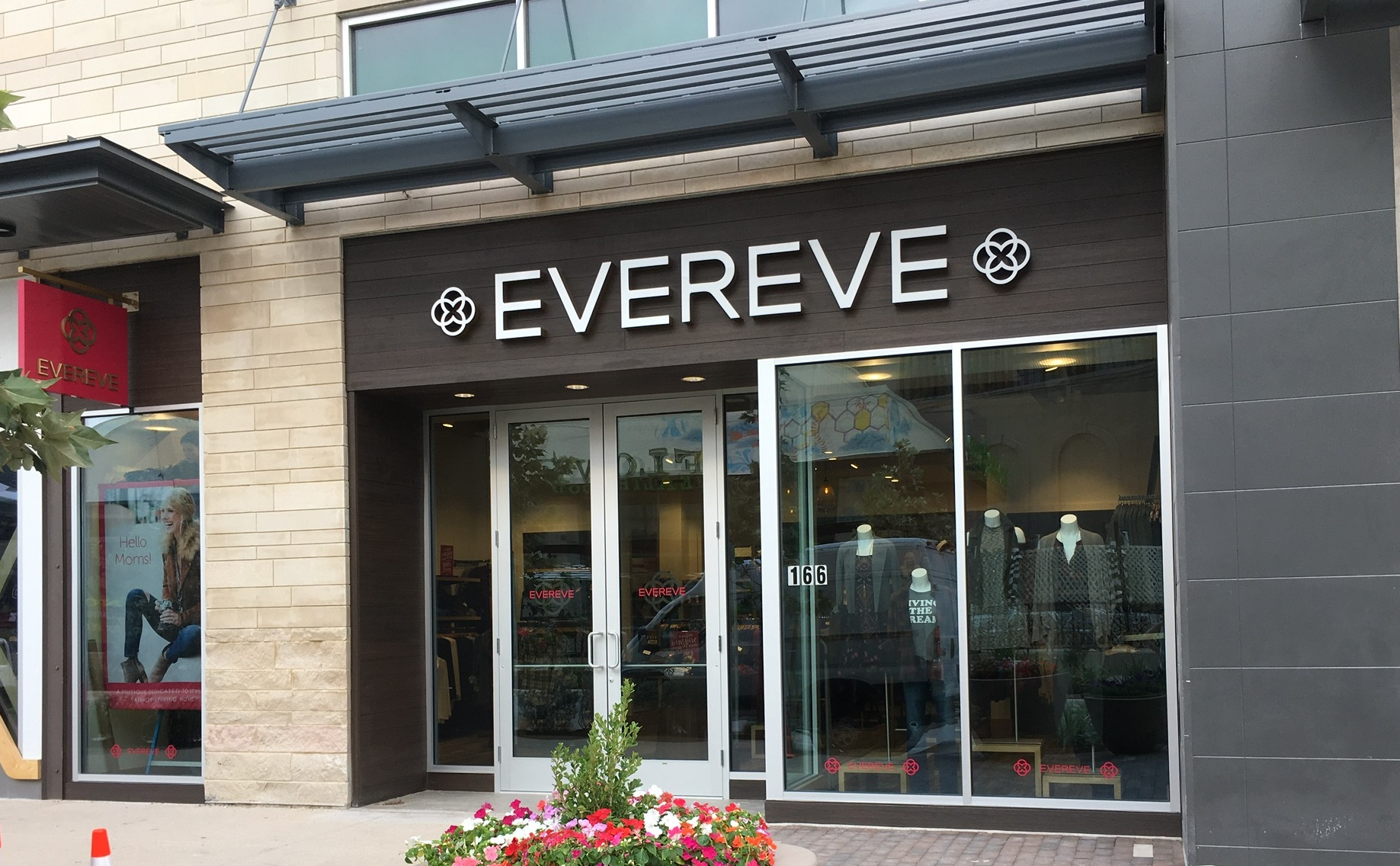 Evereve store entrance with floral planters